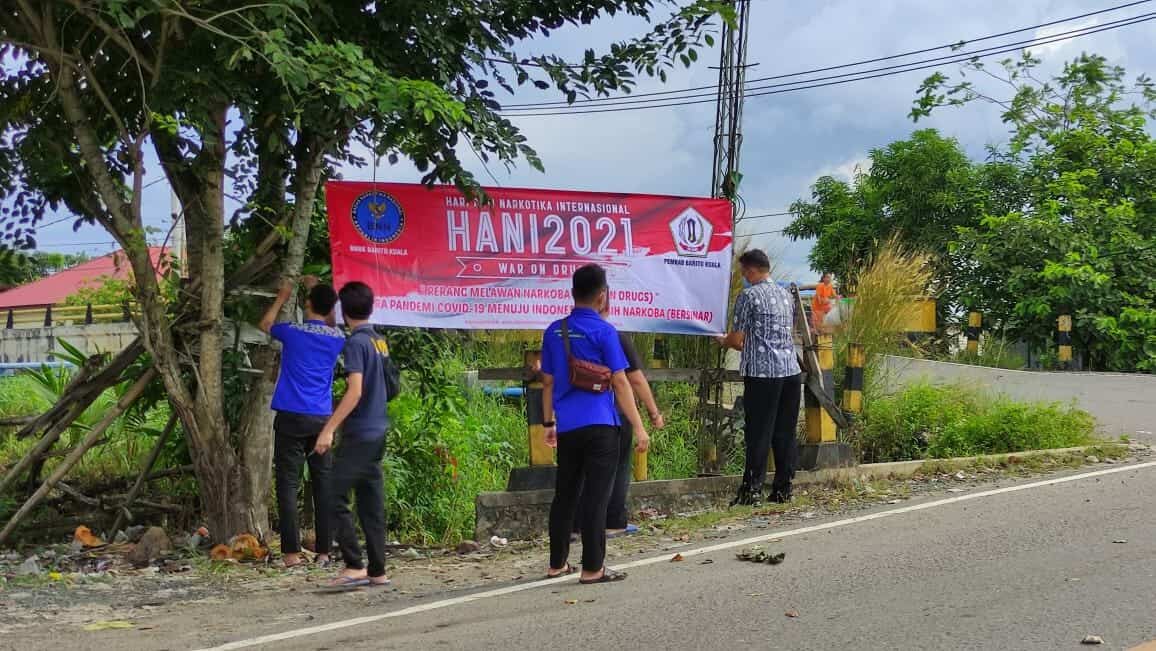 Perayaan Hari Anti Narkotika Internasional Tahun 2021 pemasangan spanduk dititik strategis
